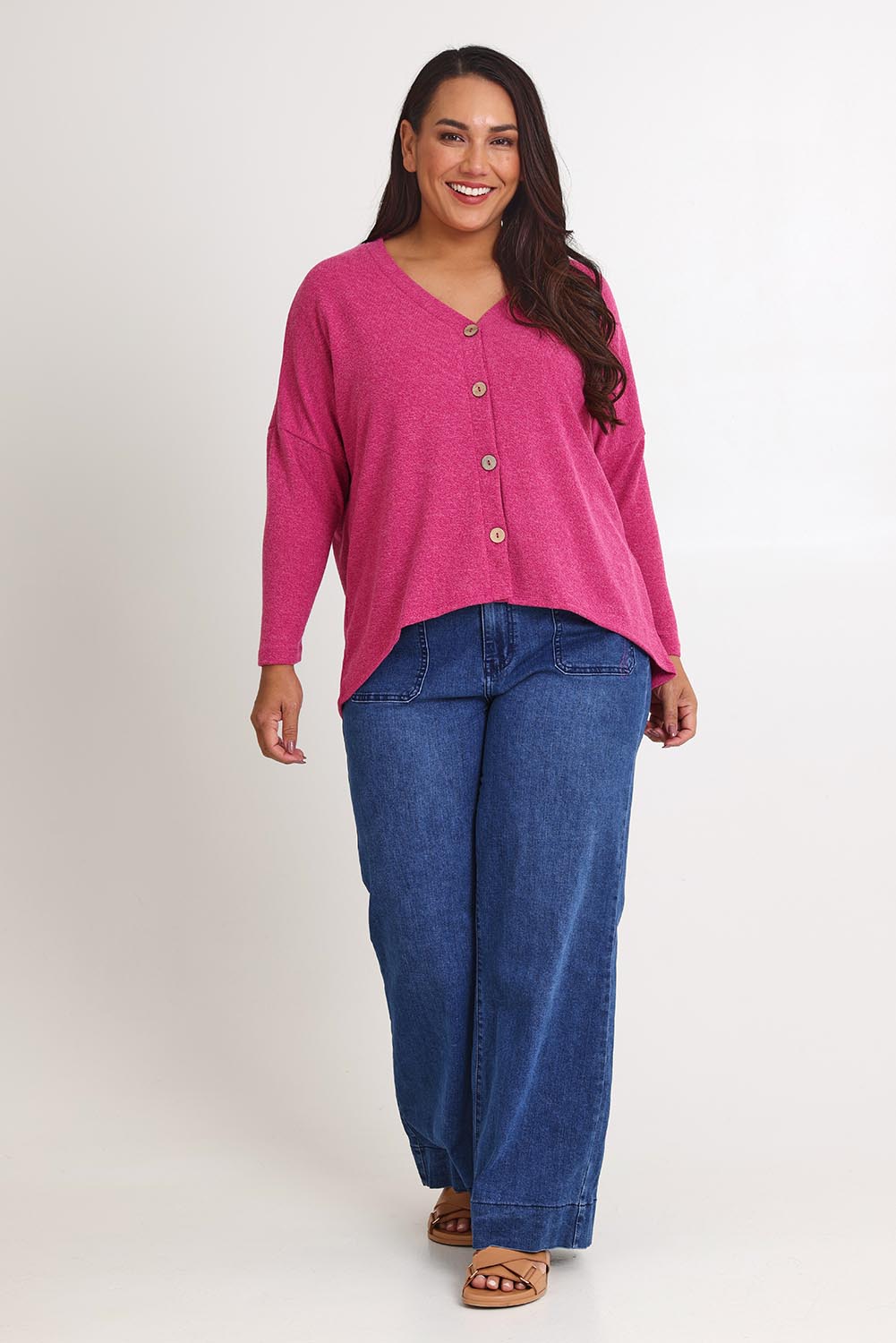 Model Ashleigh wearing size 16 of the My Boyfriends Slouch Cardi in colour Magenta (Pink), from the front, showing the whole outfit