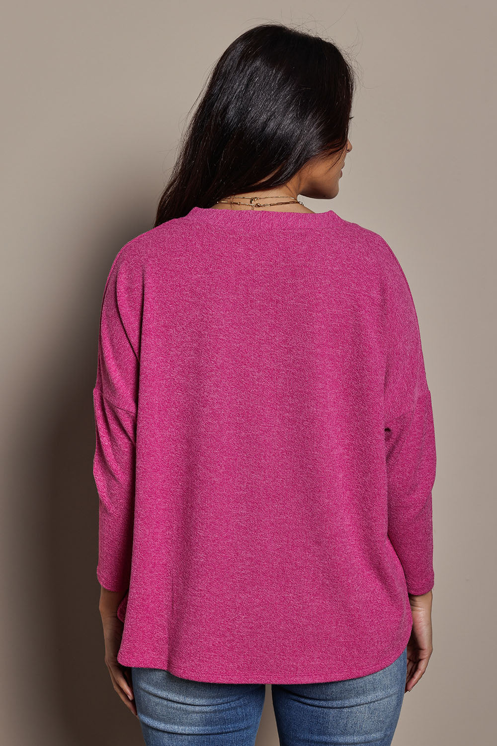 Model Tahnee wearing size 10 of the My Boyfriends Slouch Cardi in colour Magenta (Pink), from the back