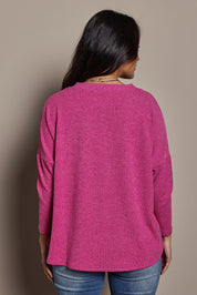 Model Tahnee wearing size 10 of the My Boyfriends Slouch Cardi in colour Magenta (Pink), from the back