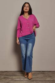 Model Tahnee wearing size 10 of the My Boyfriends Slouch Cardi in colour Magenta (Pink), from the front, showing the whole outfit
