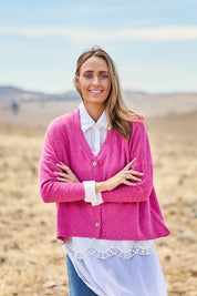 Model Tegan wearing size 10 of the My Boyfriends Slouch Cardi in colour Magenta (Pink), from the front, showing the whole outfit