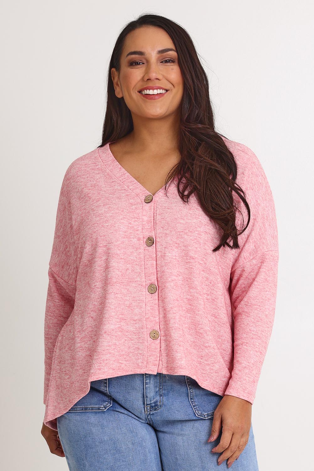 Model Ashleigh wearing size 16 of the My Boyfriends Slouch Cardi in colour Pinkmarl (Pink), from the front, cropped image