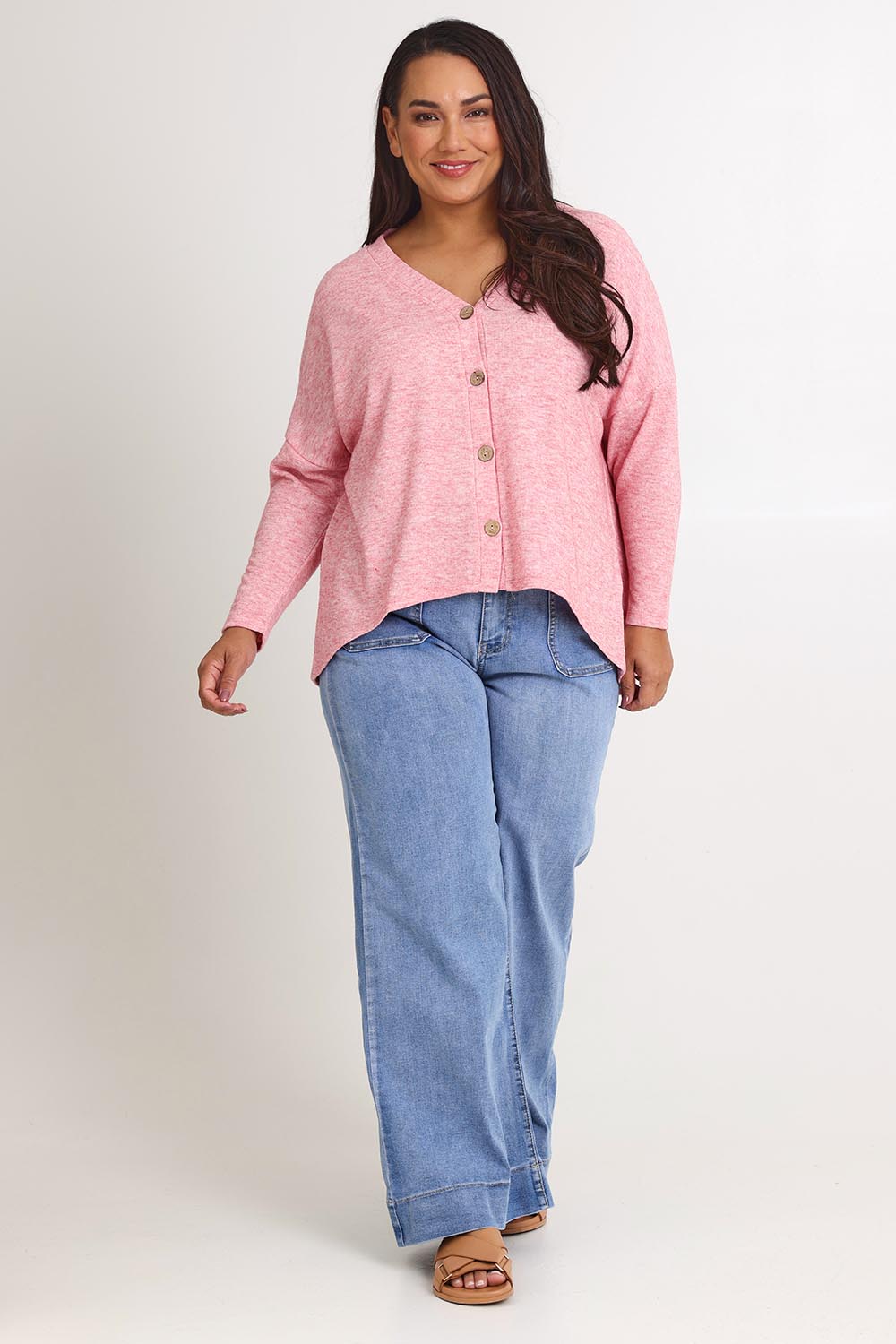 Model Ashleigh wearing size 16 of the My Boyfriends Slouch Cardi in colour Pinkmarl (Pink), from the front, showing the whole outfit