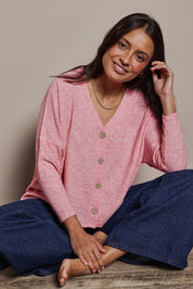 Model Tahnee wearing size 10 of the My Boyfriends Slouch Cardi in colour Pinkmarl (Pink), from the front, showing the whole outfit