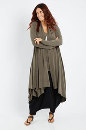 Model Laura wearing size 14 of The Wanderer In Me Swing Travel Cardi in colour Khaki (Green), from the front, showing the whole outfit
