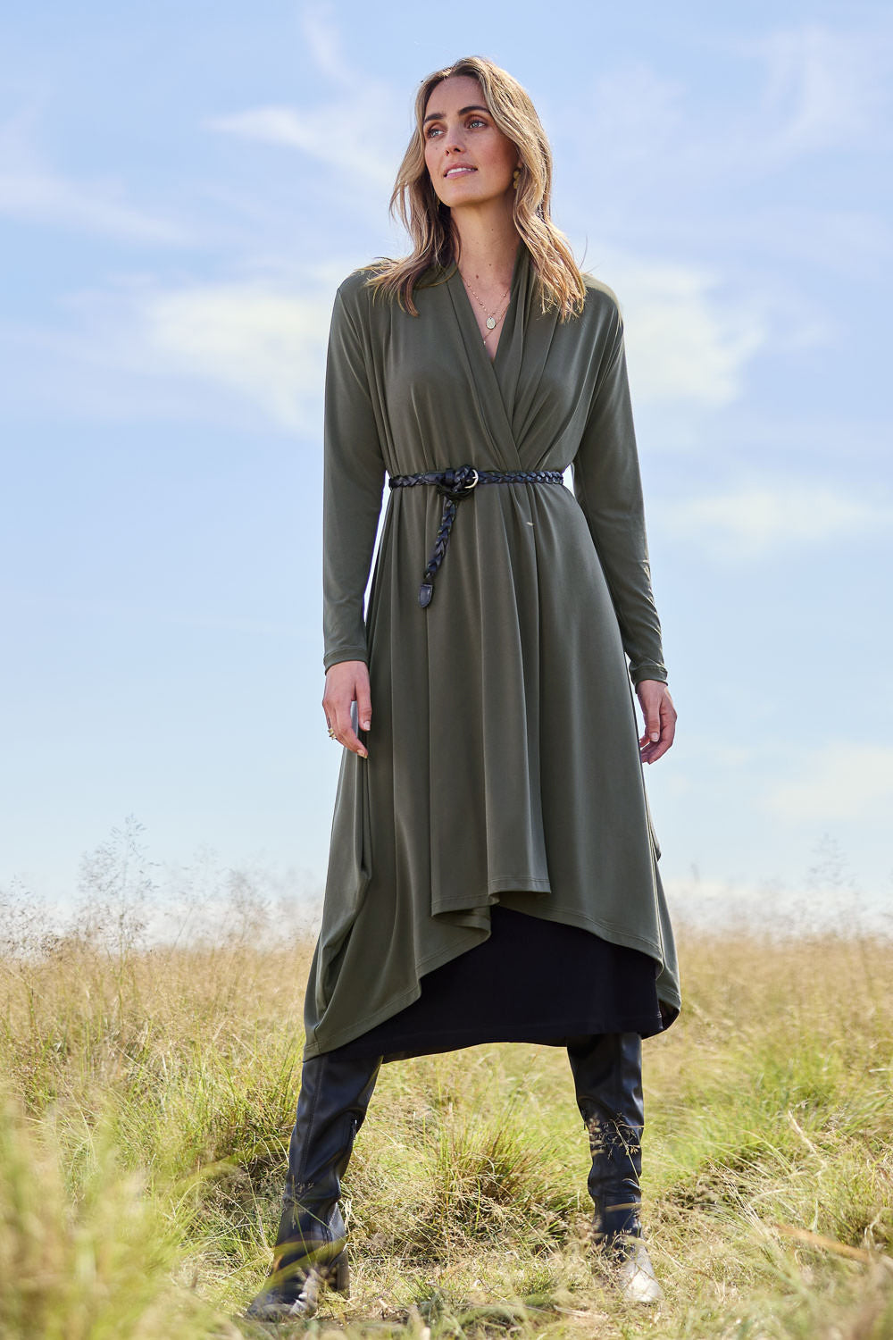 Model Tegan wearing size 10 of The Wanderer In Me Swing Travel Cardi in colour Khaki (Green), from the front, showing the whole outfit