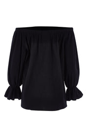 Product shot of the Twinkle In My Eye Off The Shoulder Top in colour Black (Black), from the back