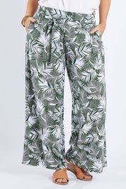 Model Laura wearing size 14 of the Flowers For Me Pants in colour Leaf (Green), from the front, cropped image