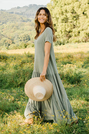 Model Ilona wearing size 10 of the Easy Tiers Maxi Dress in colour Seaspray (Green), from the front, showing the whole outfit