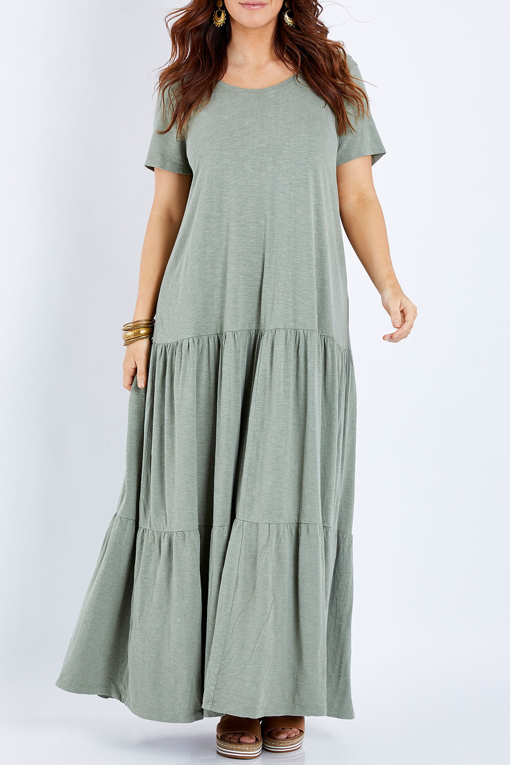 Model Laura wearing size 14 of the Easy Tiers Maxi Dress in colour Seaspray (Green), from the front, cropped image