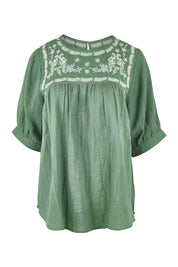 Product shot of the Secret Garden Cotton Blouse - Olive in colour Olive, from the front