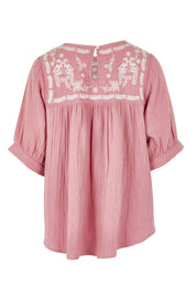 Product shot of the Secret Garden Cotton Blouse in colour Rose (Pink), from the back