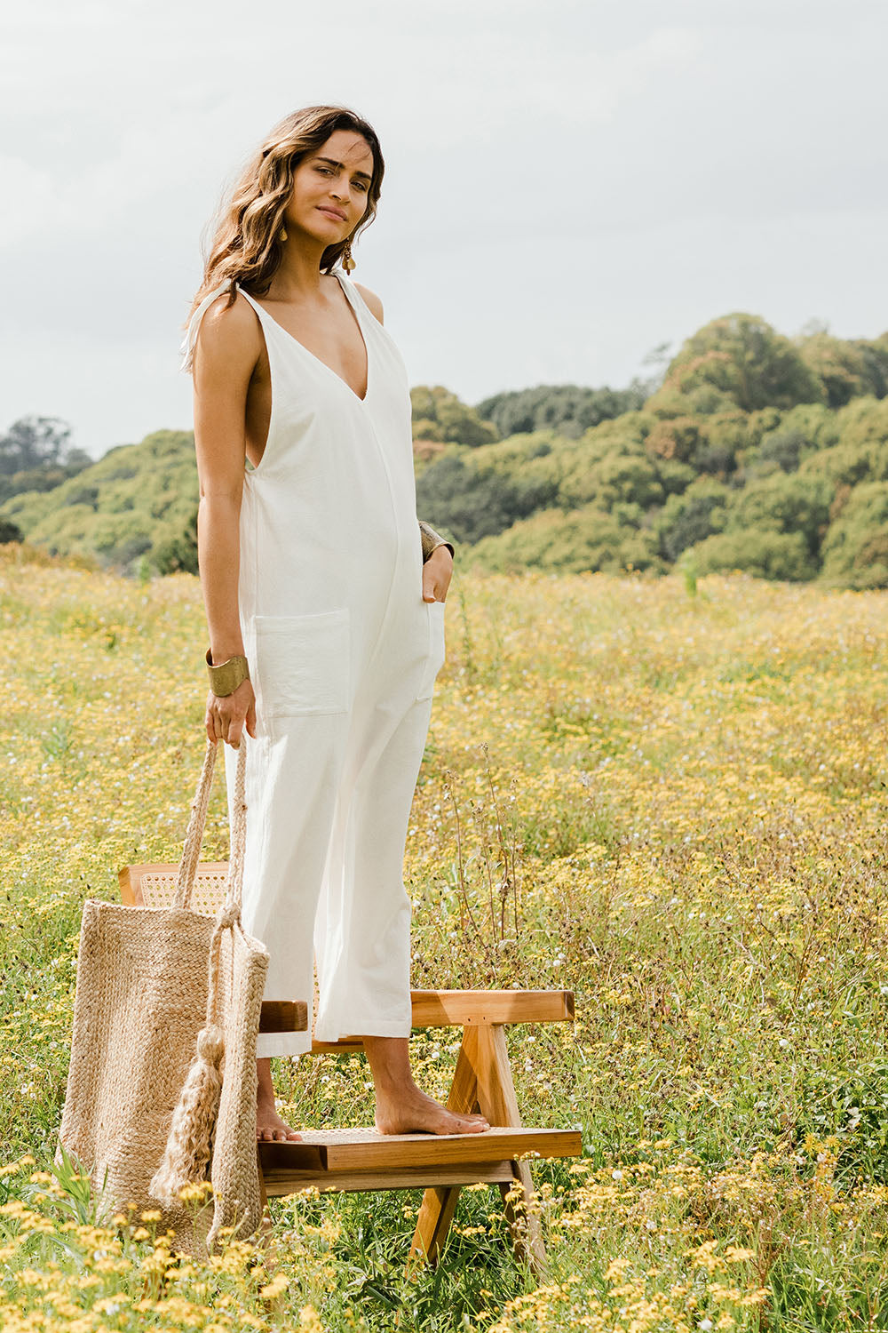 Model Ilona wearing size 10 of the Summer Breeze Jumpsuit in colour White (White), from the front, showing the whole outfit