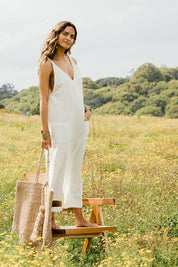 Model Ilona wearing size 10 of the Summer Breeze Jumpsuit in colour White (White), from the front, showing the whole outfit