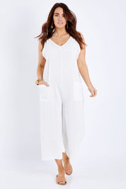 Model Laura wearing size 14 of the Summer Breeze Jumpsuit in colour White (White), from the front, showing the whole outfit