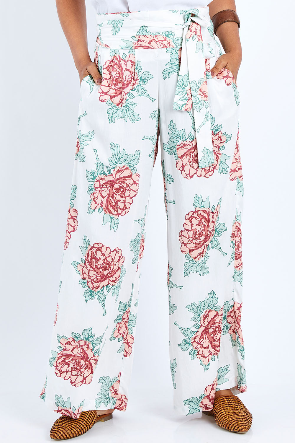 Model Pamela wearing size 10 of the Flowers For Me Pants in colour Whitefleur (White), from the front, cropped image
