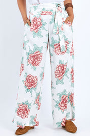 Model Pamela wearing size 10 of the Flowers For Me Pants in colour Whitefleur (White), from the front, cropped image