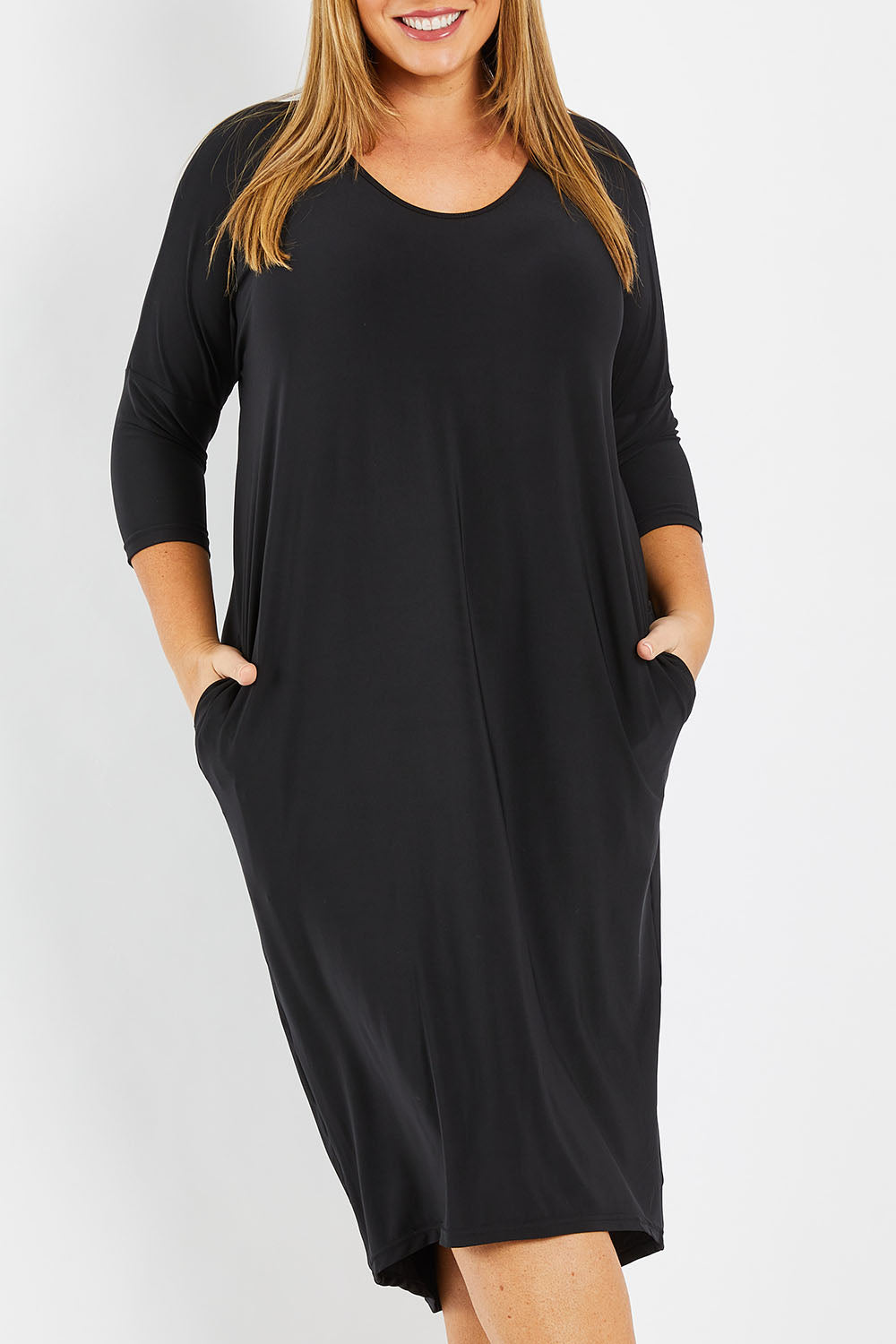 Model Fiona wearing size 16 of The Wanderer In Me Travel Dress in colour Black (Black), from the front, cropped image