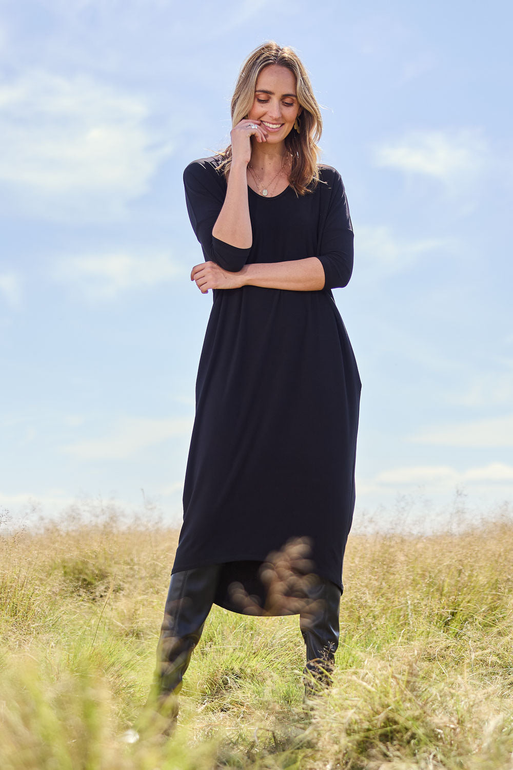 Model Kelly wearing size 10 of The Wanderer In Me Travel Dress in colour Black (Black), from the front, showing the whole outfit