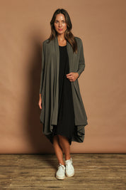 Model Madeline wearing size 10 of The Wanderer In Me Travel Dress in colour Black (Black), from the front, showing the whole outfit