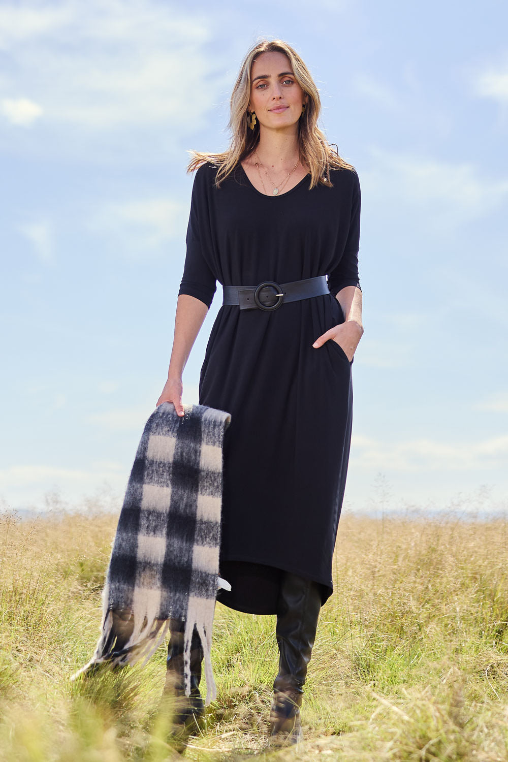 Model Tegan wearing size 10 of The Wanderer In Me Travel Dress in colour Black (Black), from the front, showing the whole outfit