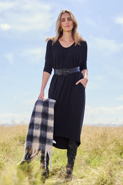 Model Tegan wearing size 10 of The Wanderer In Me Travel Dress in colour Black (Black), from the front, showing the whole outfit