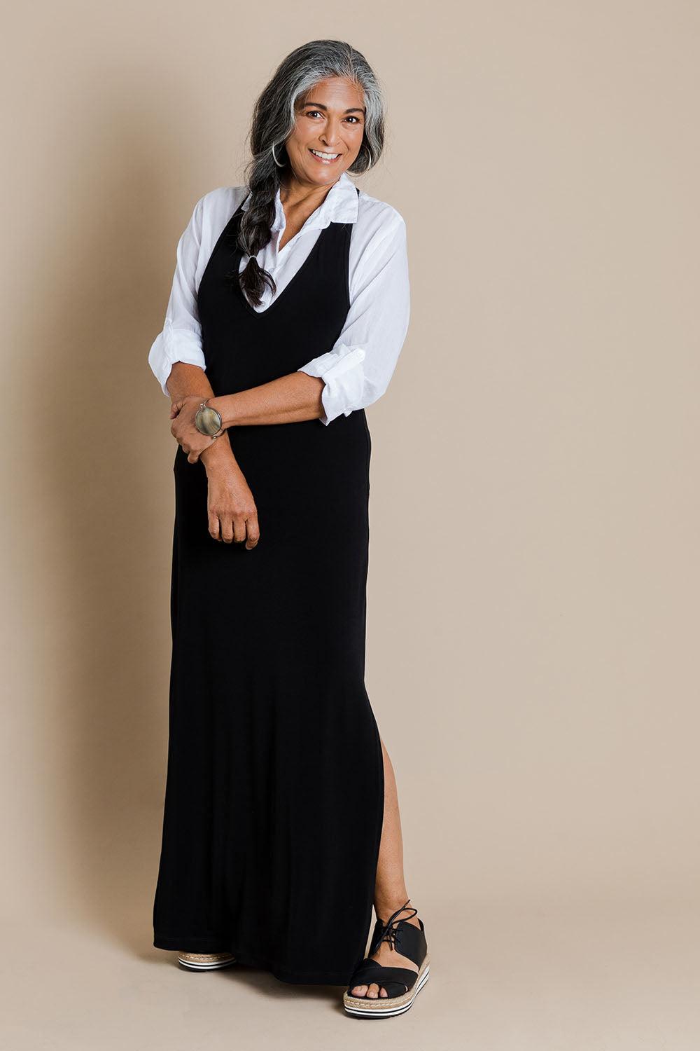 Model Nadine wearing size 10 of The Wanderer In Me T Back Maxi in colour Black (Black), from the front, showing the whole outfit