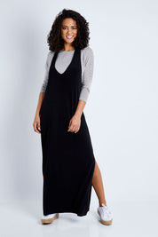 Model Pamela wearing size 10 of The Wanderer In Me T Back Maxi in colour Black (Black), from the front, showing the whole outfit
