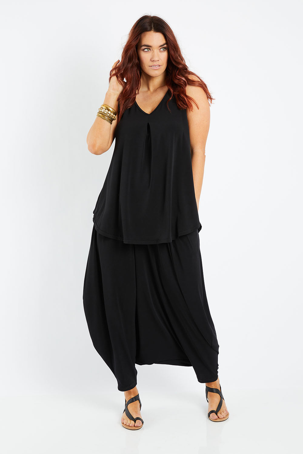 Model Laura wearing size 14 of The Wanderer In Me V Neck Travel Singlet in colour Black (Black), from the front, showing the whole outfit