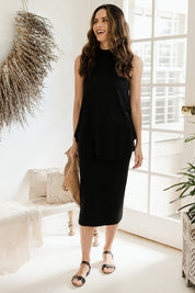 Model Ilona wearing size 10 of the Softly Swinging Bamboo Singlet in colour Black (Black), from the front, showing the whole outfit