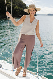Model Tegan wearing size 10 of the Good Vibes Balloon Hem Pants in colour Tobacco, from the front, showing the whole outfit