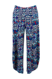Product shot of the Good Vibes Balloon Hem Pants in colour Aztec (Blue), from the front