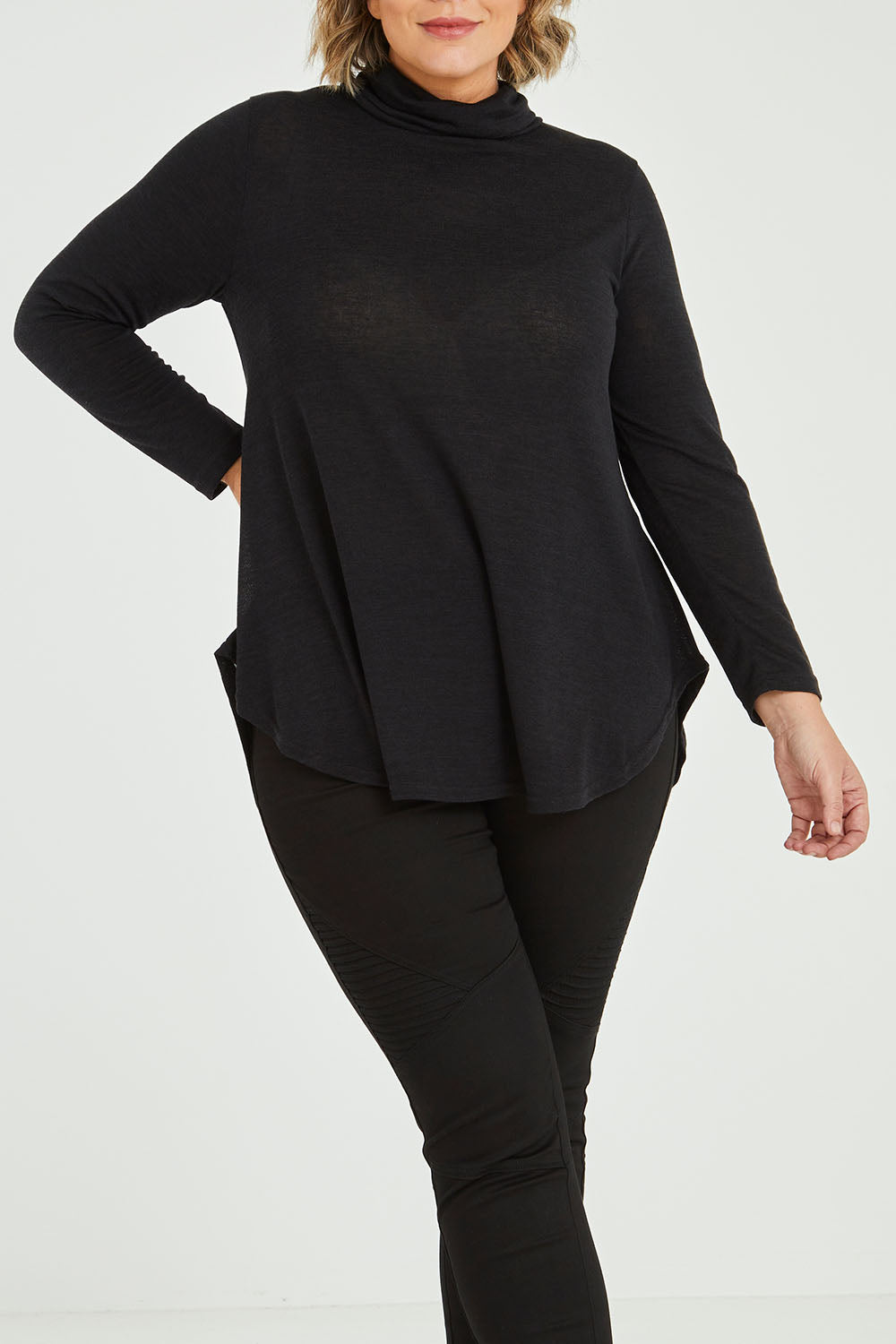 Model Fiona wearing size 16 of the Falling For You Skivvy Tunic in colour Black (Black), from the front, cropped image