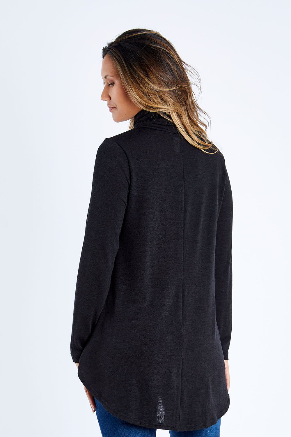 Model Kimberley wearing size 10 of the Falling For You Skivvy Tunic in colour Black (Black), from the back
