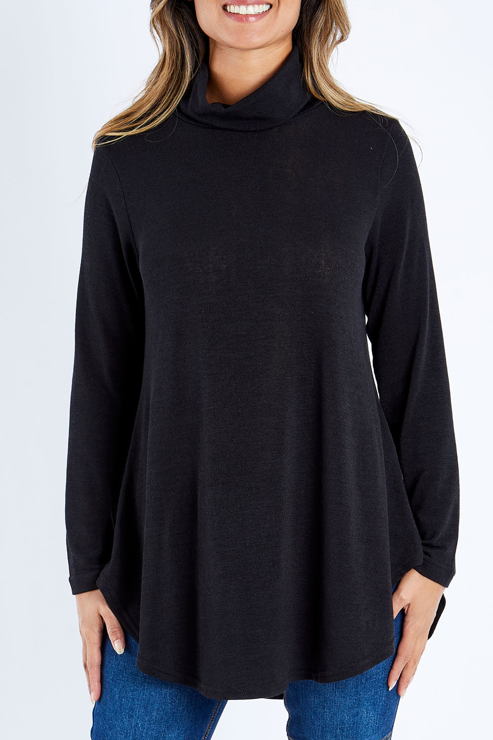 Model Kimberley wearing size 10 of the Falling For You Skivvy Tunic in colour Black (Black), from the front, cropped image