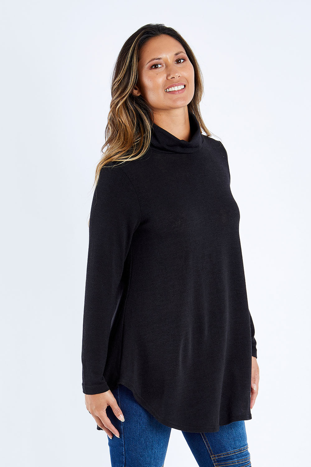 Model Kimberley wearing size 10 of the Falling For You Skivvy Tunic in colour Black (Black), from the front, cropped image