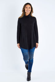 Model Kimberley wearing size 10 of the Falling For You Skivvy Tunic in colour Black (Black), from the front, showing the whole outfit
