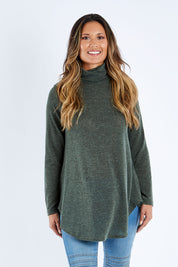 Model Kimberley wearing size 10 of the Falling For You Skivvy Tunic in colour Khaki (Green), from the front, cropped image