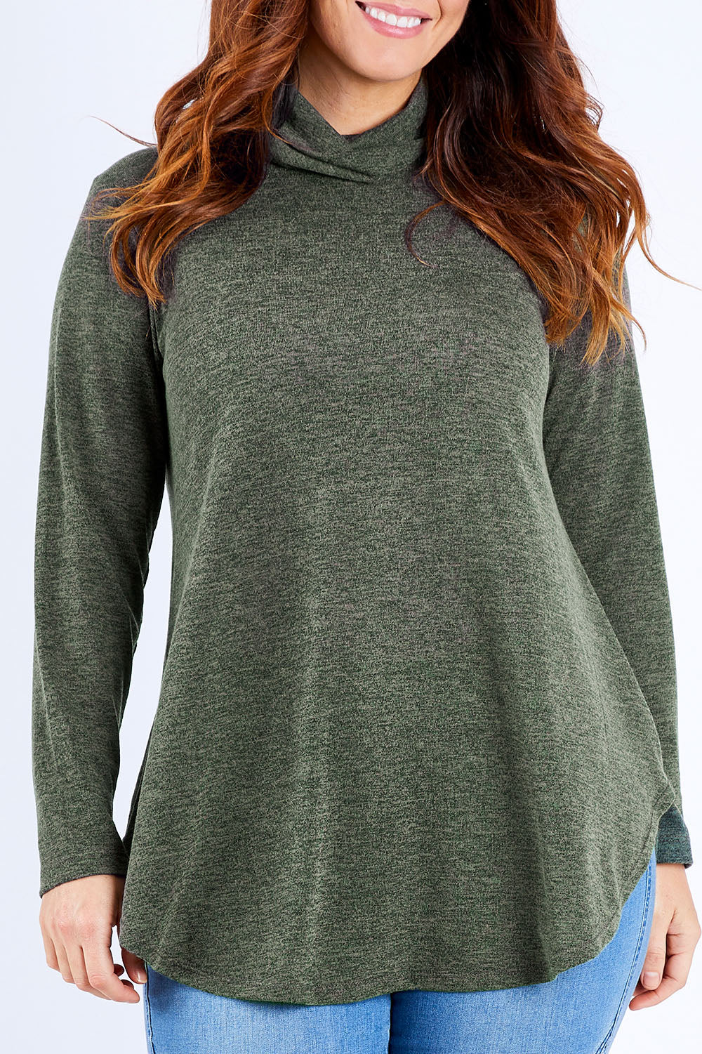 Model Laura wearing size 14 of the Falling For You Skivvy Tunic in colour Khaki (Green), from the front, cropped image