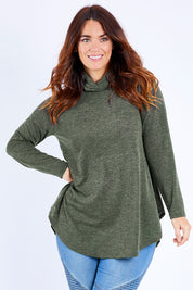 Model Laura wearing size 14 of the Falling For You Skivvy Tunic in colour Khaki (Green), from the front, cropped image