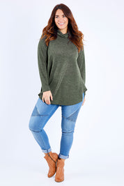 Model Laura wearing size 14 of the Falling For You Skivvy Tunic in colour Khaki (Green), from the front, showing the whole outfit