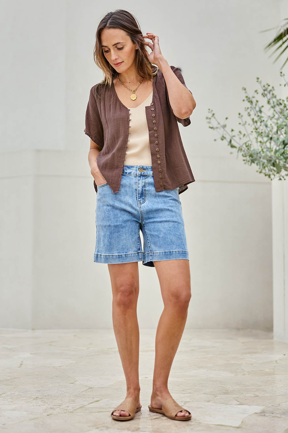 Model Tegand wearing size 10 of the Youre Always There For Me Plain Boyfriend Shorts – Denim in colour Denim, from the front