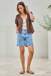 Model Tegand wearing size 10 of the Youre Always There For Me Plain Boyfriend Shorts – Denim in colour Denim, from the front
