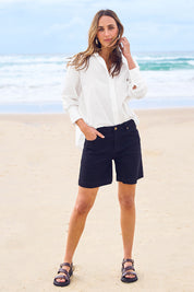 Model Tegan wearing size 10 of the Youre Always There For Me Boyfriend Shorts in colour Black (Black), from the front, showing the whole outfit