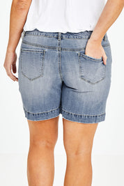 Model Laura wearing size 14 of the Youre Always There For Me Boyfriend Shorts in colour Denim (Blue), from the back