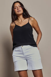 Model Tahnee wearing size 10 of the Youre Always There For Me Boyfriend Shorts in colour White (White), from the front, cropped image