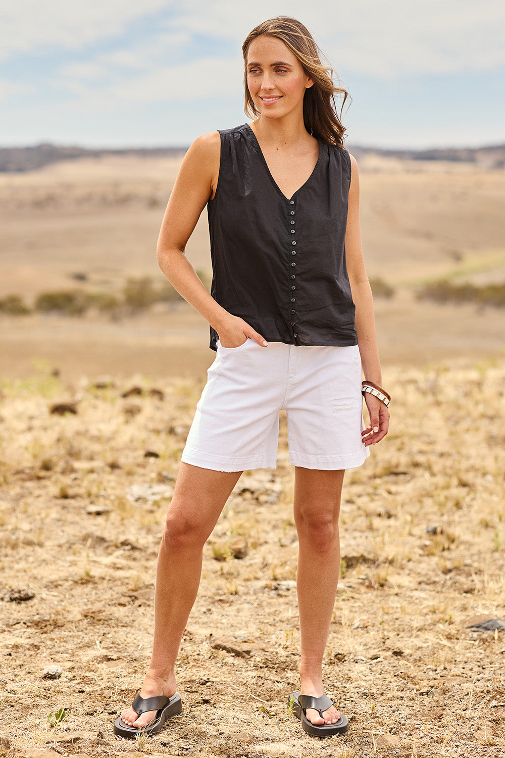 Model Tegan wearing size 10 of the Youre Always There For Me Boyfriend Shorts in colour White (White), from the front, showing the whole outfit