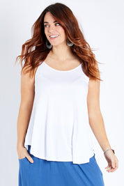 Model Laura wearing size 12 of the Softly Swinging Bamboo Scoop Singlet in colour White (White), from the front, cropped image