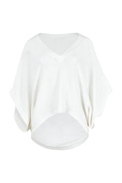 Product shot of the Knit Pick Throw V Neck Sweater in colour Milk (White), from the front