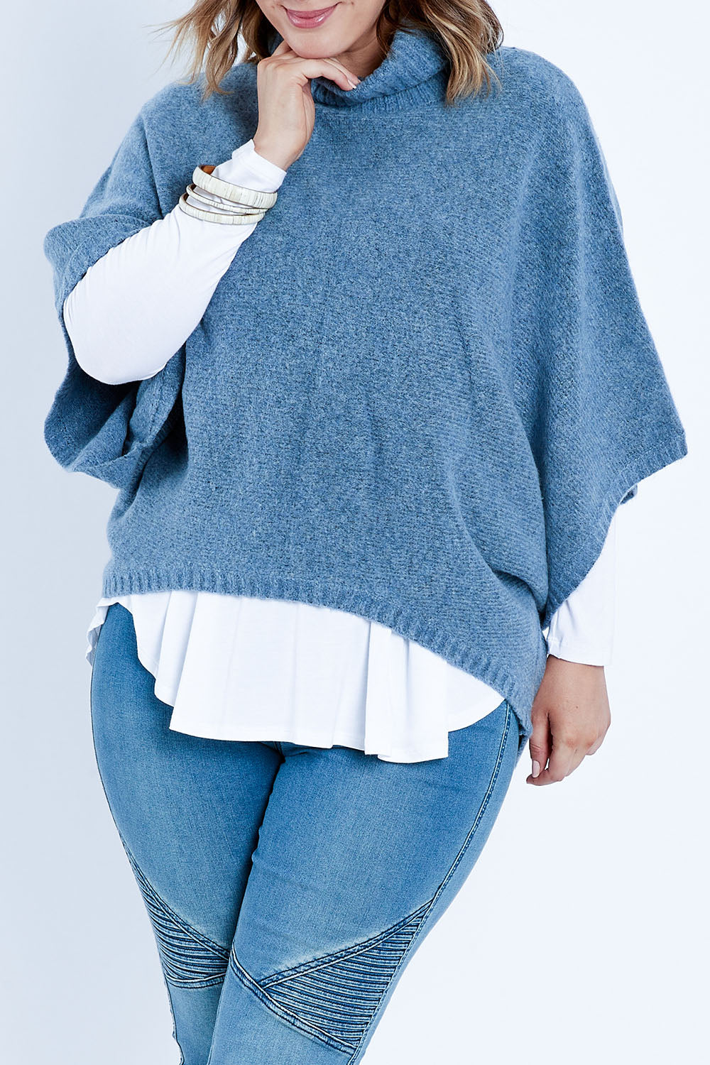 Model Jess wearing size L of the Addicted To You Sweater in colour Denim (Blue), from the front, cropped image
